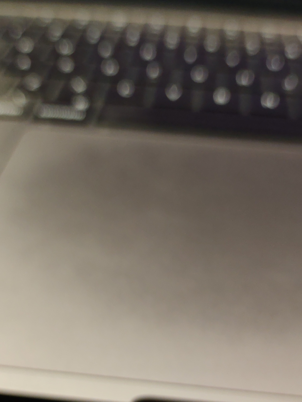 Unbranded Silver Laptop Trackpad and Keyboard